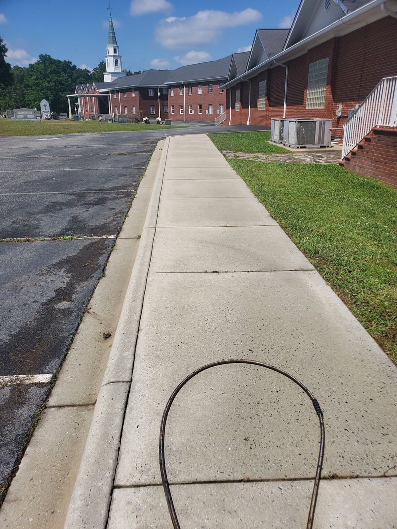 Church sidewalk after pressure washing